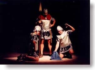 Three Roman guards gamble for Jesus' garment.
