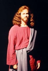 A close up of a man dressed as Jesus.
