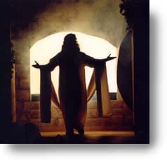 An image of Jesus silhouetted in front of the open tomb.