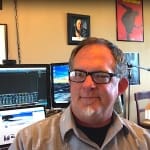 Keith Ward sitting in his studio.